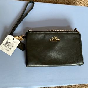 Never used Coach black leather clutch